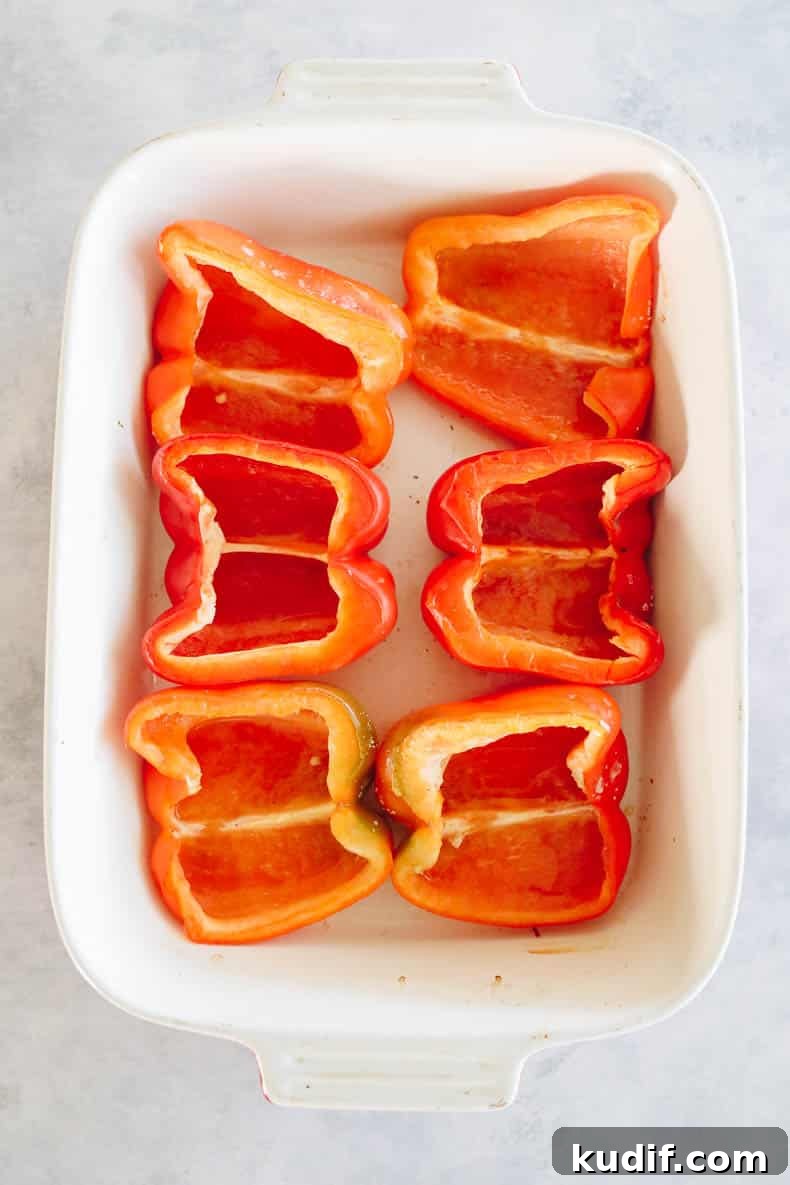 Quinoa-Stuffed Bell Peppers with Savory Tomato Filling 3 Baked red bell peppers cut in half