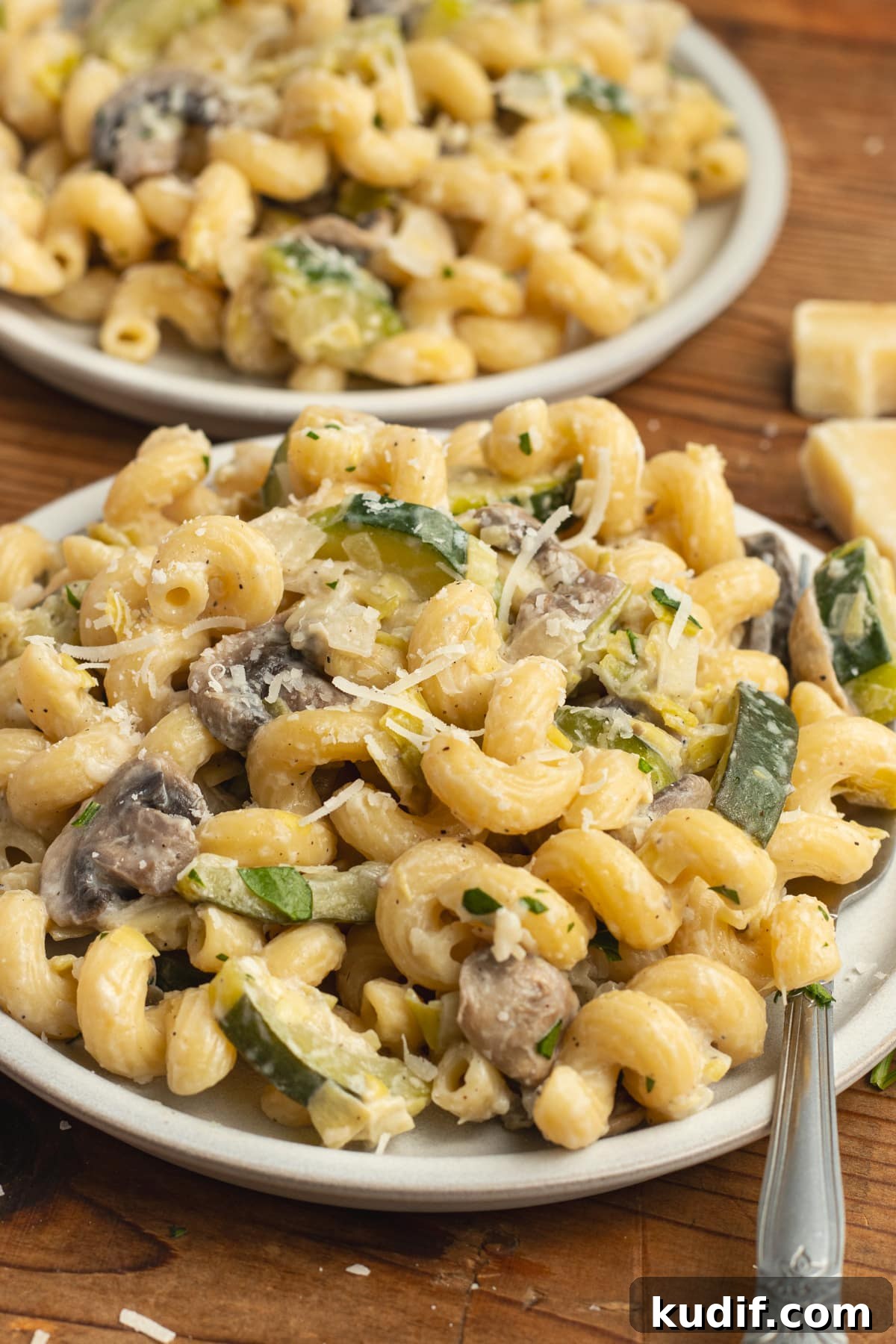 Zucchini, Mushroom & Leek Pasta Recipe — Creamy Spring Pasta 15 This is a picture of a plate with zucchini mushroom pasta.
