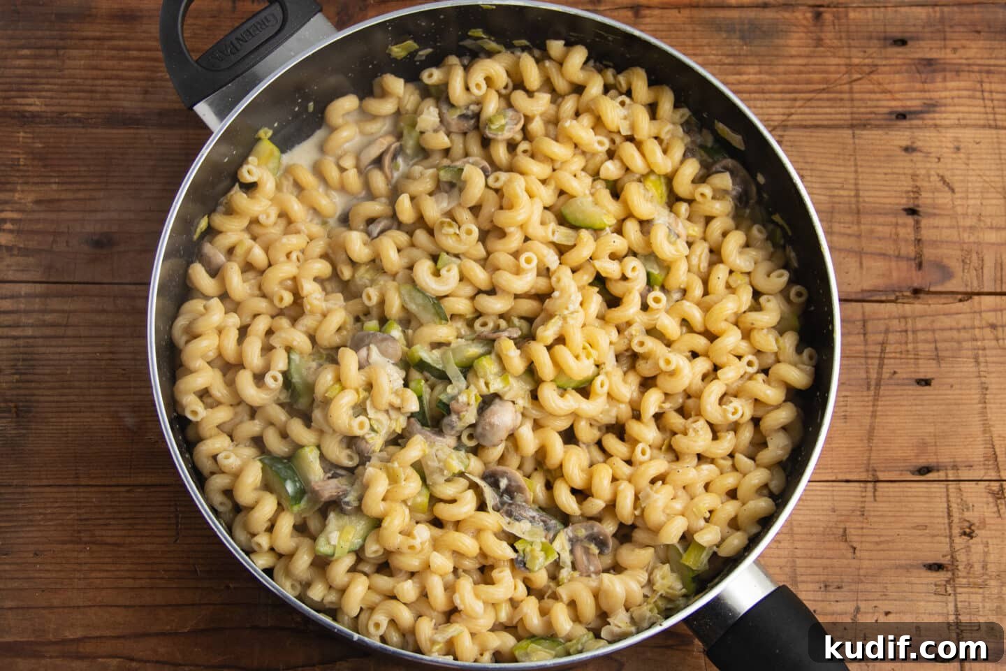 Zucchini, Mushroom & Leek Pasta Recipe — Creamy Spring Pasta 10 This is a picture of the skillet with pasta and lemon added.