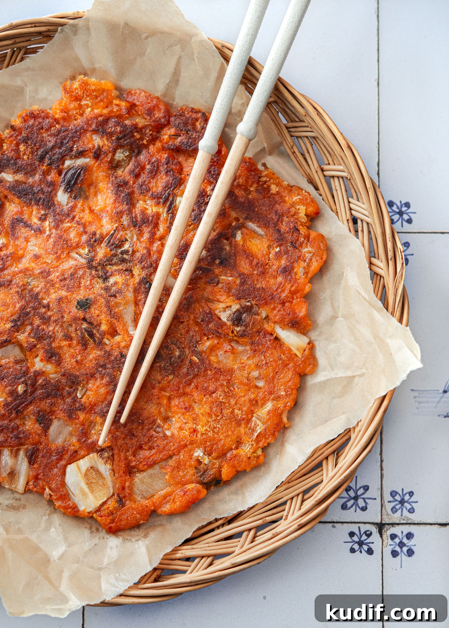 Crispy Kimchi Pancakes (Kimchi Jeon) Recipe for Perfect Pan-Fried Kimchi Cakes 5 Extra crispy kimchi pancake with caramelized edges and visible kimchi pieces