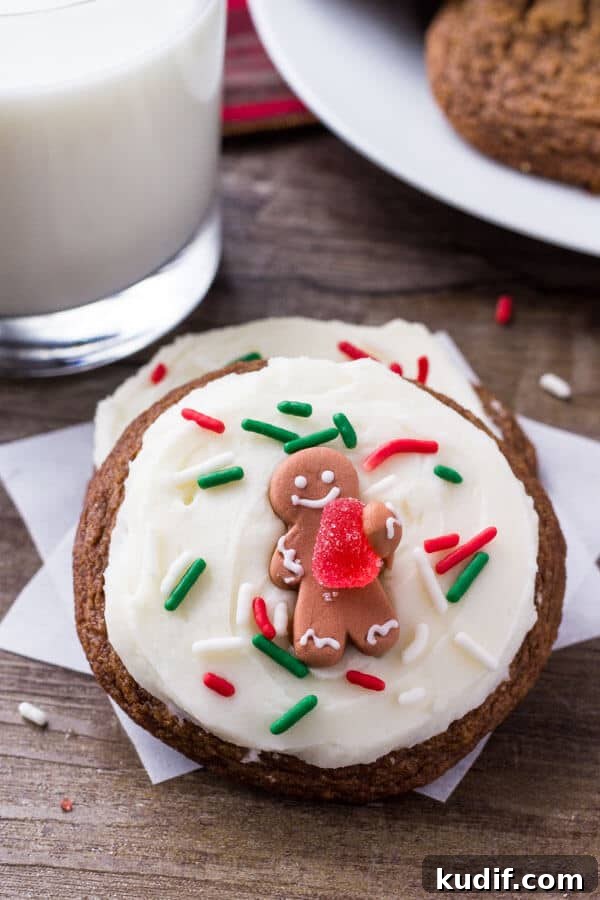 These easy gingerbread cookies are soft, chewy & perfect for the holidays. It's a no chill recipe - so they take way less time to make than regular gingerbread cookies. Then they're topped with fluffy cream cheese frosting.