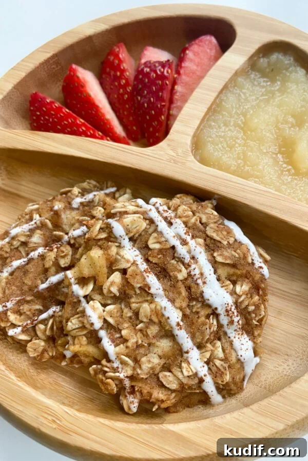 Cinnamon apple oatmeal cookies served with strawberries and applesauce