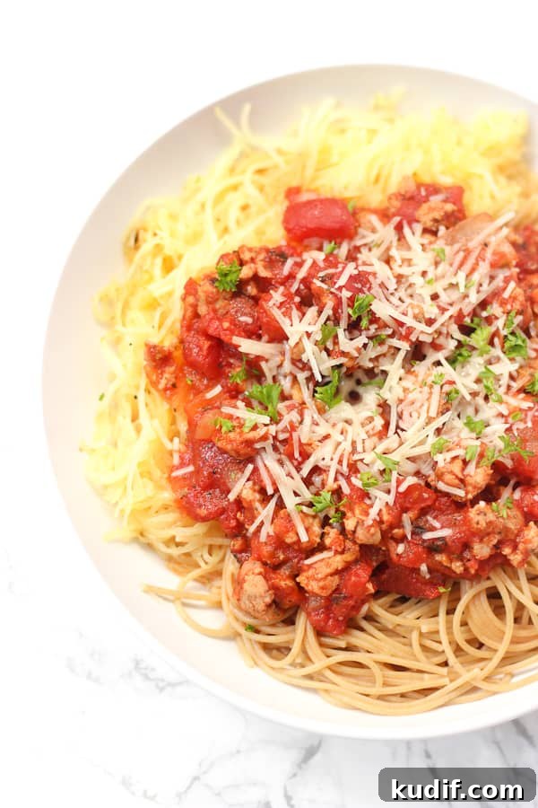 Spaghetti Squash Pasta Bowls with Savory Sauce and Veggies 2 Spaghetti Squash Pasta Bowls: a giant, healthy bowl of pasta!