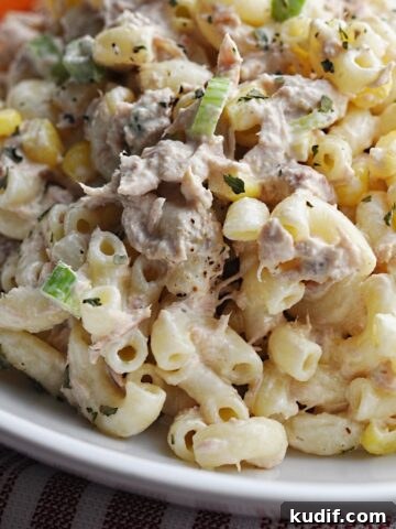 Macaroni salad with tuna and corn on a plate
