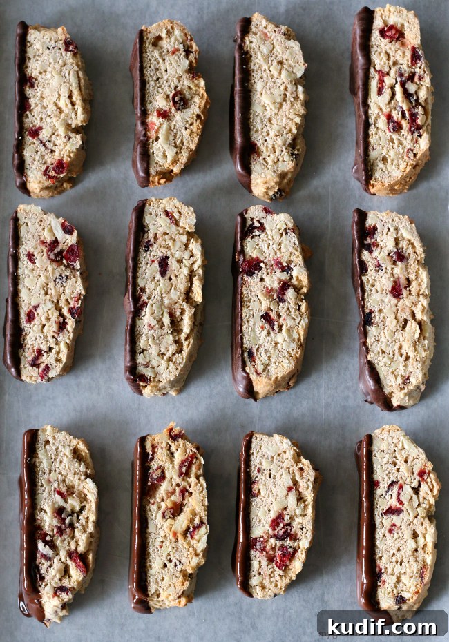 Gluten-free Almond Biscotti sliced on baking sheet
