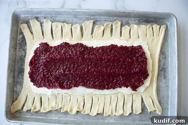 Raspberry Crescent Danish: Flaky Pastry Recipe for Brunch 12 assembling raspberry danish pastry