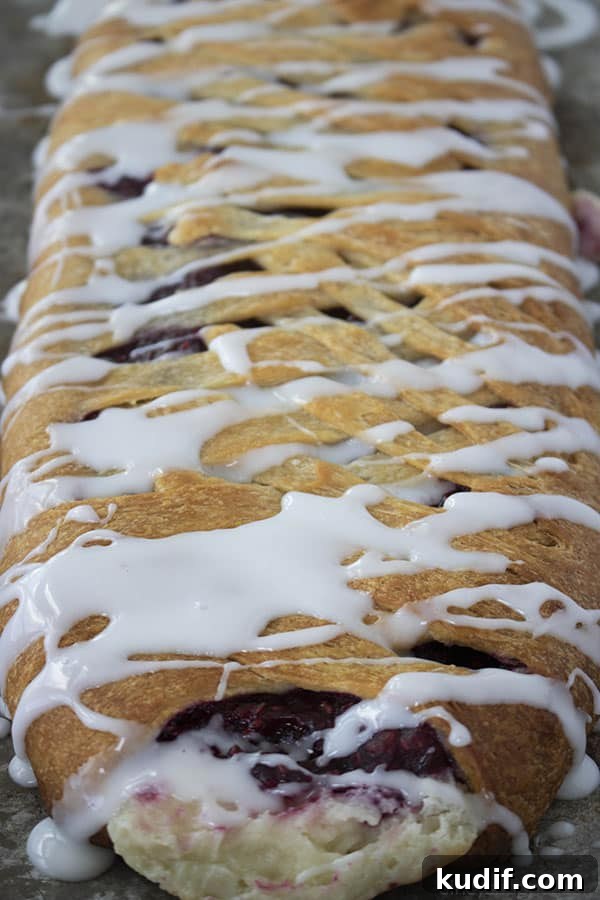Raspberry Crescent Danish: Flaky Pastry Recipe for Brunch 16 glazed homemade pastry braid with raspberry filling
