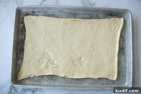 Raspberry Crescent Danish: Flaky Pastry Recipe for Brunch 10 sheet of crescent roll dough on baking pan