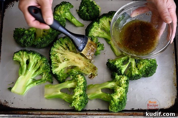 Brushing marinade on broccoli