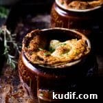 When a wild mushroom stew meets puff pastry the most incredible and scrumptious crockpot beef pot pie is born. The stew is incredibly flavorful and ridiculously simple. Cooking it in the crockpot makes this a perfect make ahead, minimal effort entree that will blow everyone at your dinner table away.