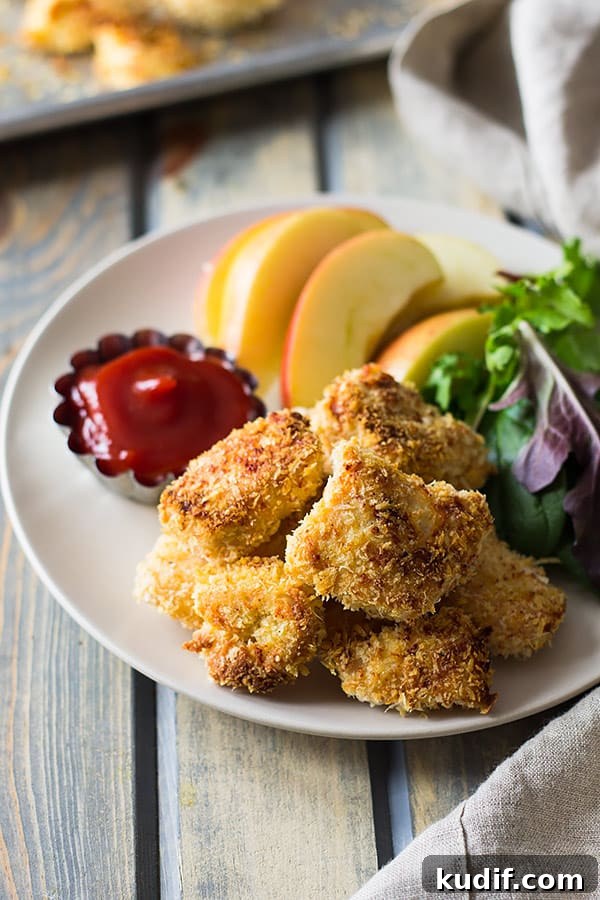 Crispy Oven-Baked Homemade Chicken Nuggets Recipe 2 These Baked Homemade Chicken Nuggets are way better than the store bought and you can pronounce everything on these golden nuggets! | www.countrysidecravings.com
