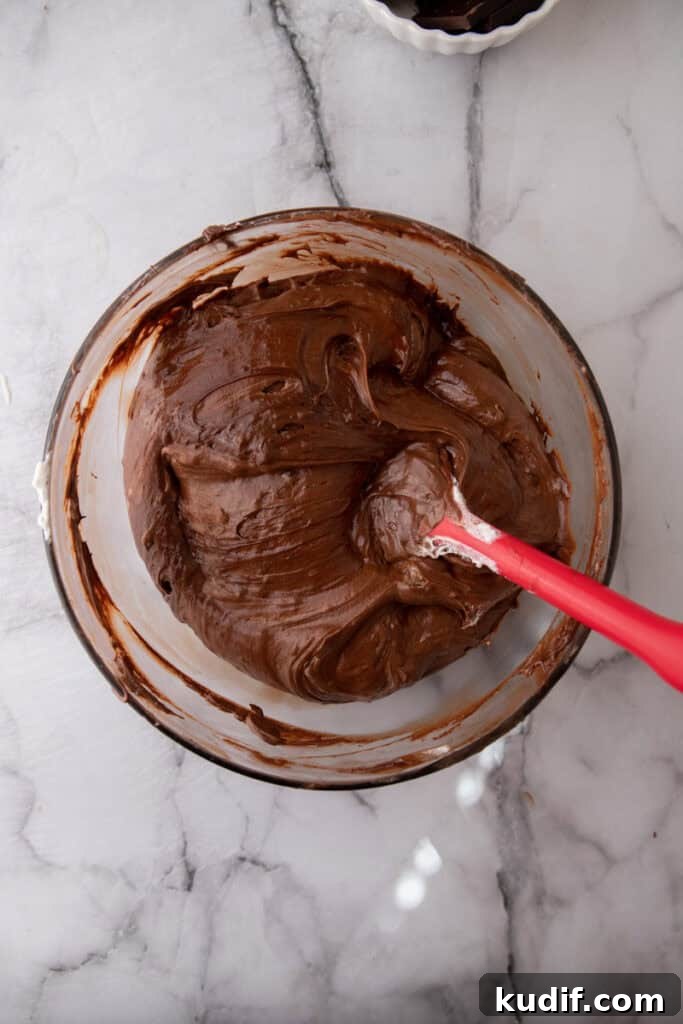 Chocolate mousse-like mixture after folding Cool Whip into melted chocolate.