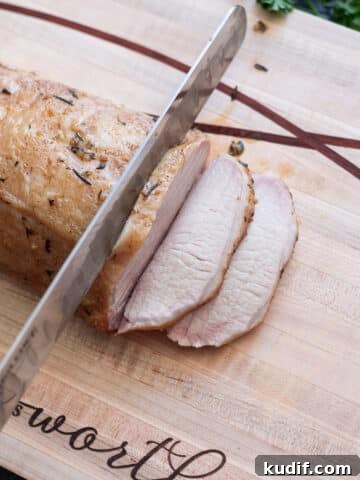 Slicing up smoked pork loins.