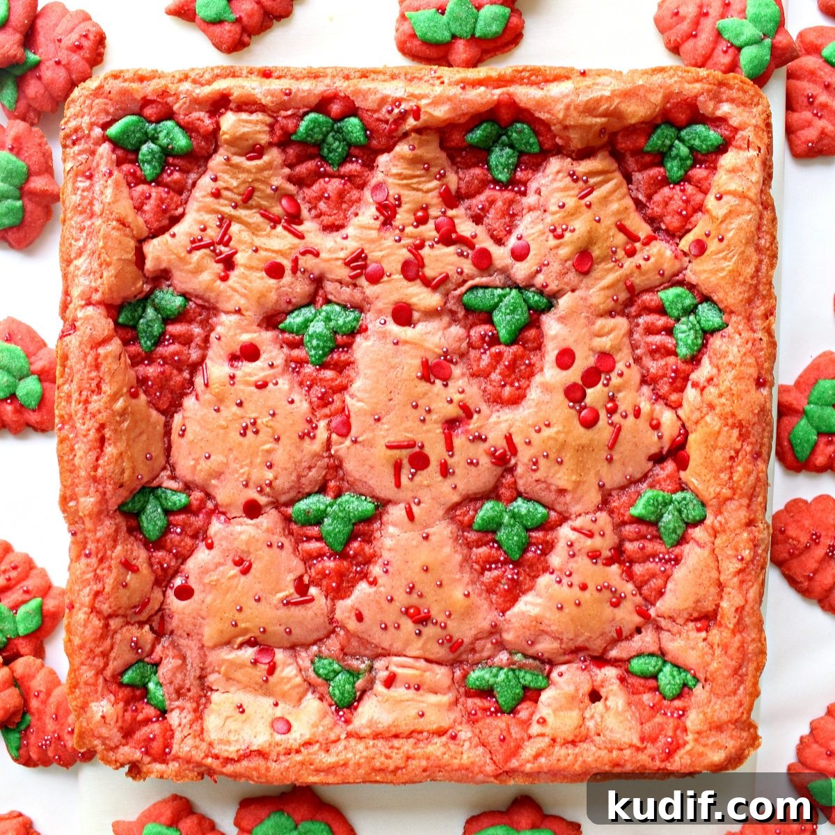 Decadent Strawberry Swirl Brownies: Chocolate & Fresh Berry Recipe 5 Uncut pan of Strawberry Brownies with Strawberry Press Cookies baked on top for decoration.