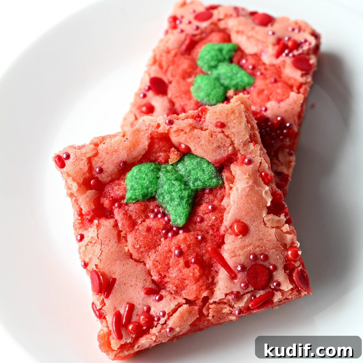 Decadent Strawberry Swirl Brownies: Chocolate & Fresh Berry Recipe 6 Two Strawberry Brownies on a white plate.