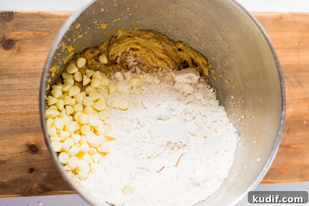 Spooky Halloween Sprinkle Cookies Recipe for Party Treats 5 Cookie dough ingredients in a mixing bowl.