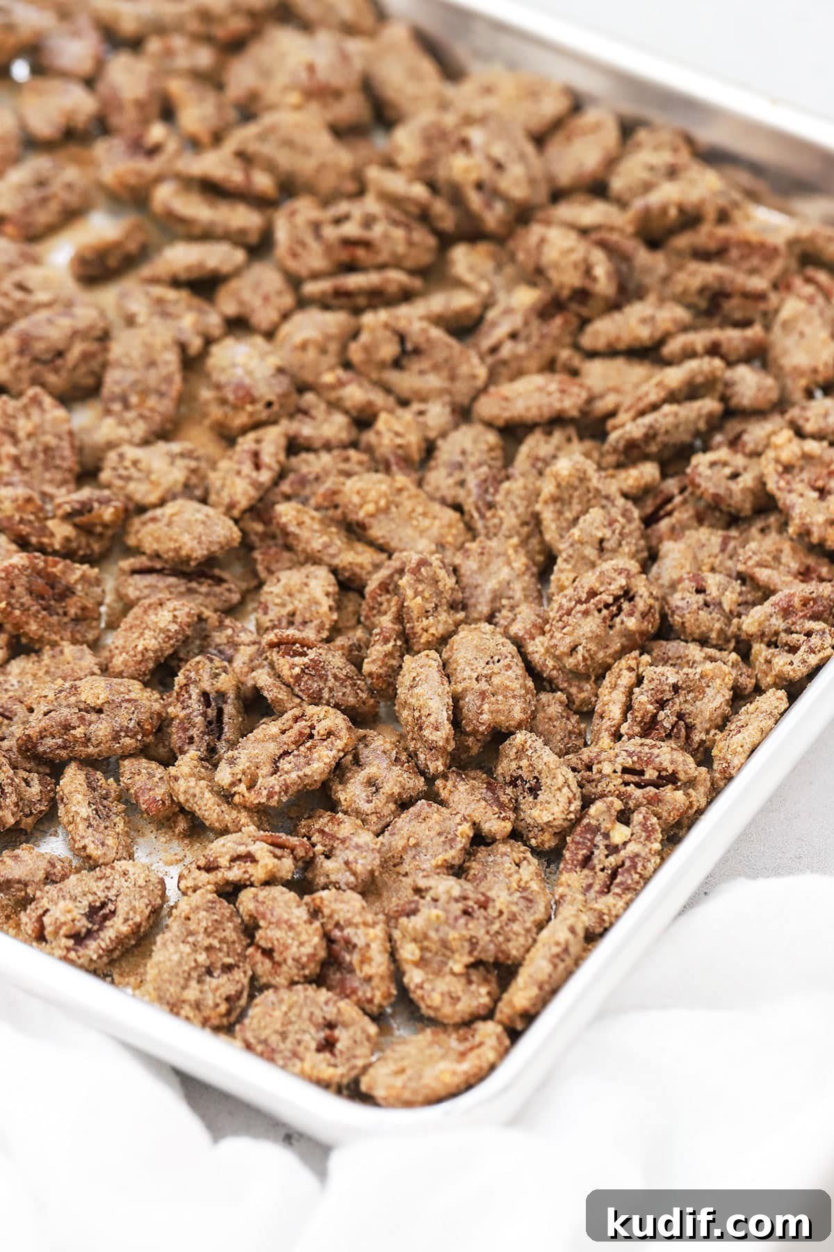 a pan of cinnamon roasted pecans