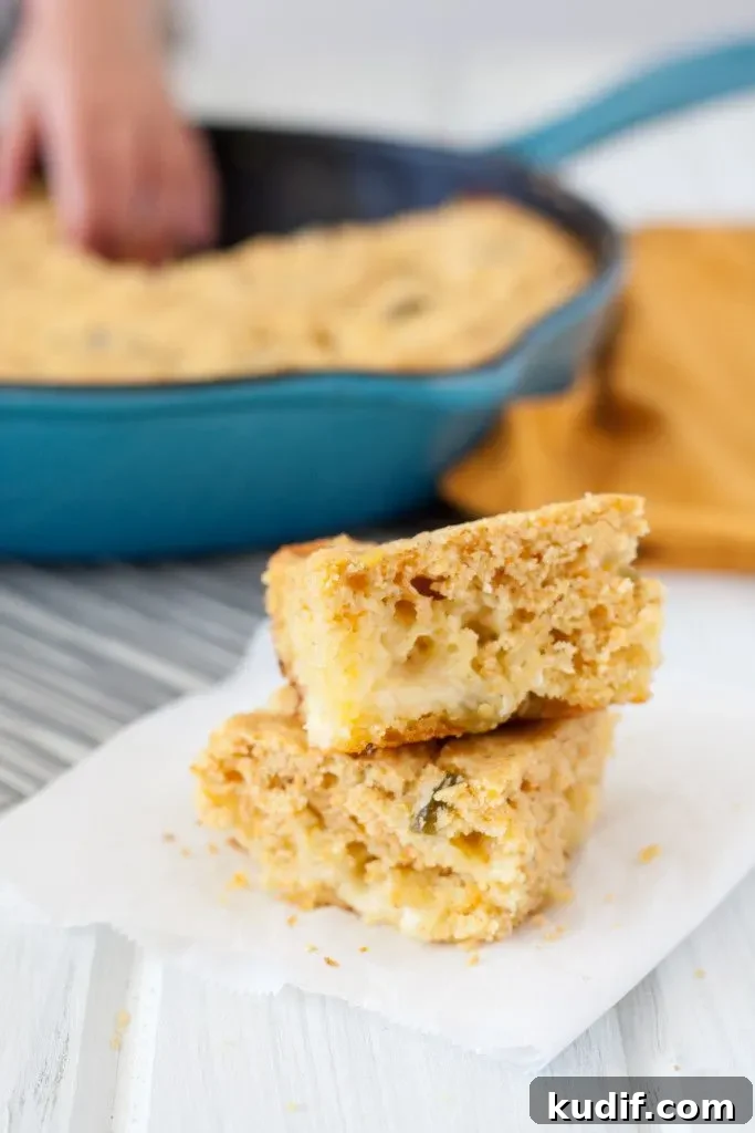 Smoked Cheddar Candied Jalapeno Cornbread - Spicy with a hint of sweet and cheesy... need I say more? Recipe on GoodieGodmother.com