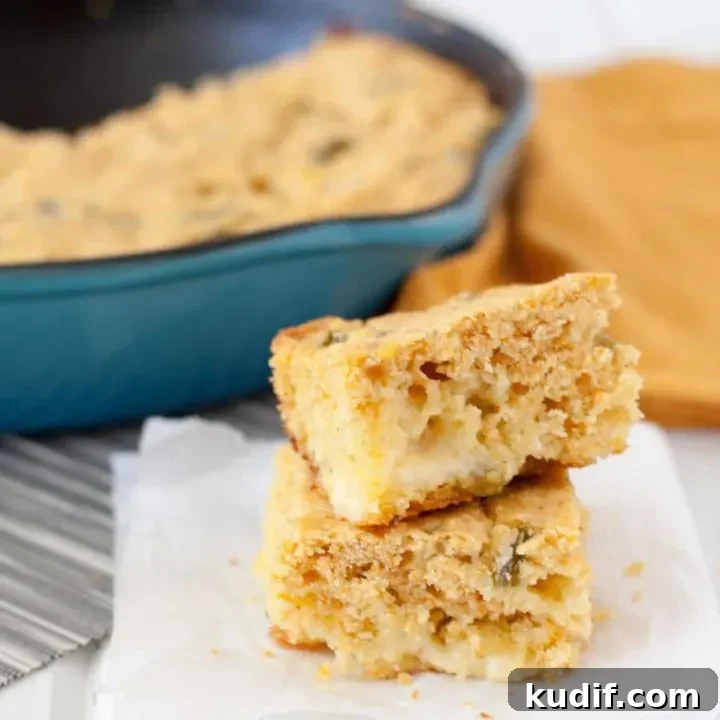 Smoked Cheddar Candied Jalapeno Cornbread - Spicy with a hint of sweet and cheesy... need I say more? Recipe on GoodieGodmother.com