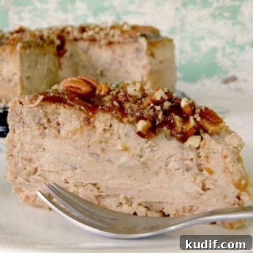 A slice of pecan praline cheesecake on a plate.