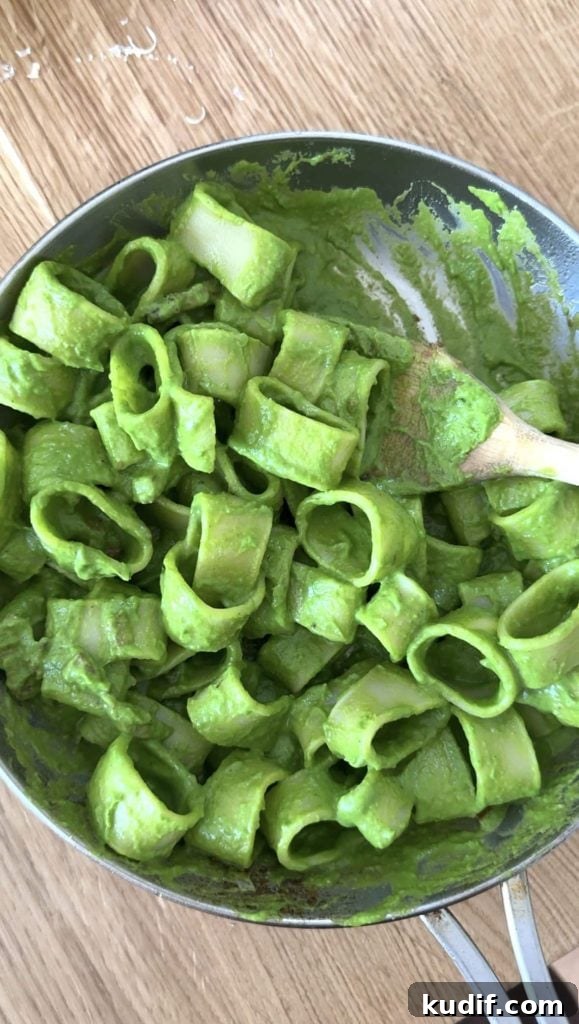 Creamy Spinach & Herb Pasta in Green Sauce 11 pasta in green sauce in a silver frying pan